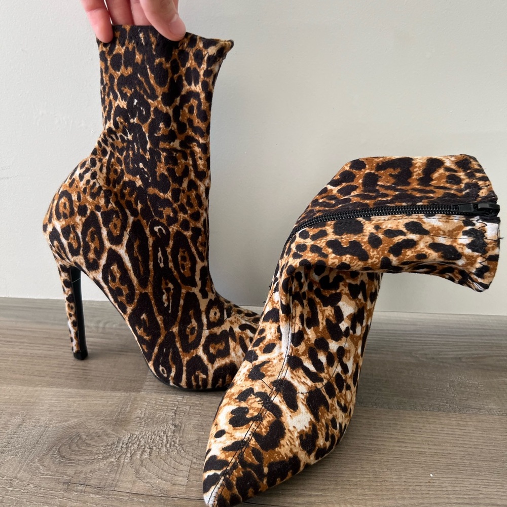 Cheetah print high-heeled boots